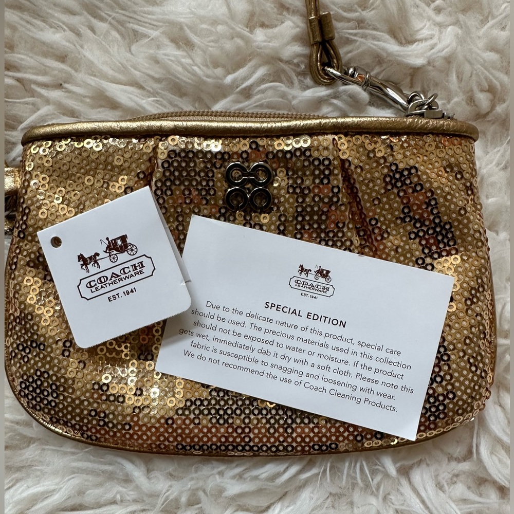 NWT Special edition gold Coach wristlet